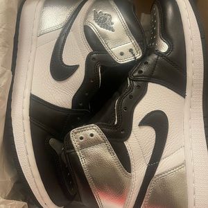 Jordan 1 retro high silver toe.